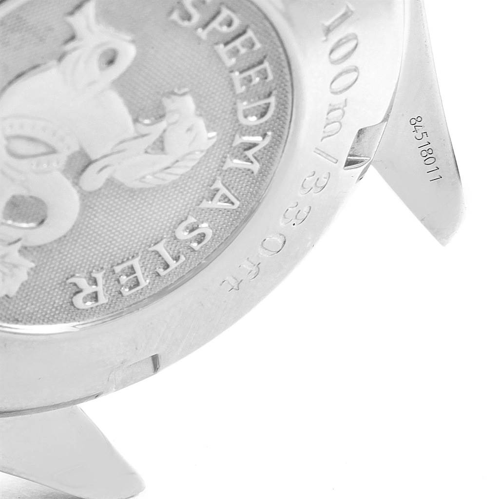 The image shows a close-up of the back casing and part of a lug of the Omega Speedmaster 3210.51.00 Men
s Stainless Steel Black Dial 3210.51.00 Men
s Stainless Steel Black Dial watch.