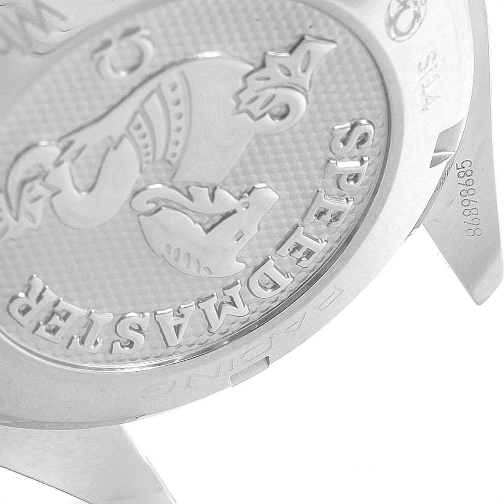 The image shows the case back of an Omega Speedmaster 326.30.40.50.03.001 Men
s Stainless Steel Blue Dial 326.30.40.50.03.001 Men
s Stainless Steel Blue Dial watch detailing its embossed design.