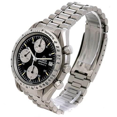 The image shows an Omega Speedmaster 3511.   50.   00 Men
s Stainless Steel Black Dial 3511.   50.   00 Men
s Stainless Steel Black Dial watch at an angle highlighting its face, bezel, pushers, and stainless steel bracelet.