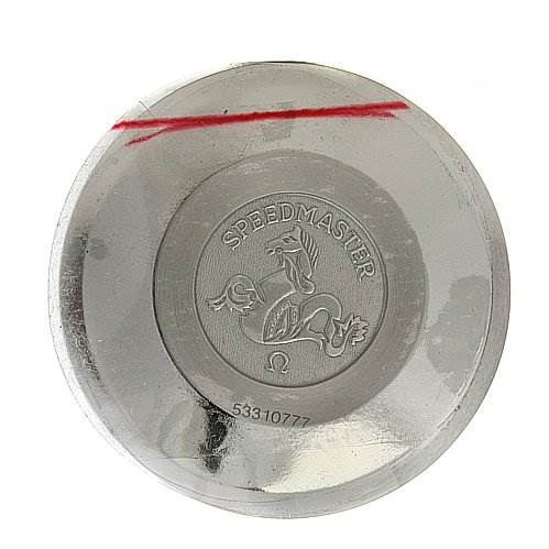 This image shows the back casing of an Omega Speedmaster 3511.   50.   00 Men
s Stainless Steel Black Dial 3511.   50.   00 Men
s Stainless Steel Black Dial watch, displaying its emblem and serial number.