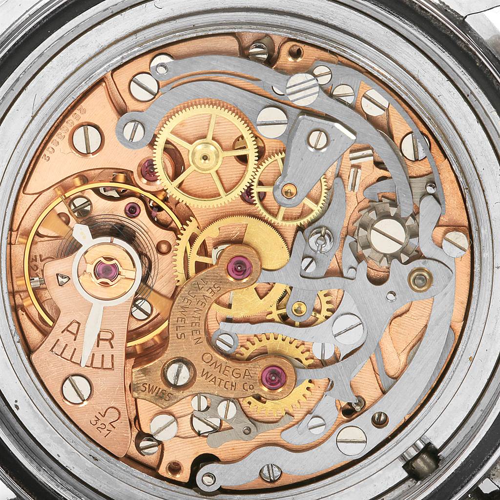 The image shows the intricate internal mechanism and movement of the Omega Speedmaster 145.012 Men
s Stainless Steel Black Dial 145.012 Men
s Stainless Steel Black Dial watch from a close-up angle.