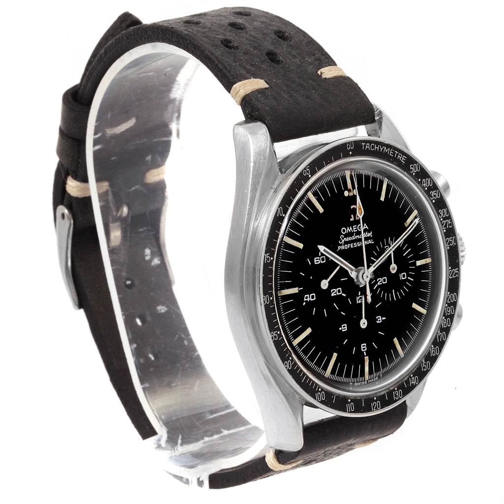 This image shows the Omega Speedmaster 145.012 Men
s Stainless Steel Black Dial 145.012 Men
s Stainless Steel Black Dial watch from an angled perspective, highlighting its face, bezel, and leather strap.
