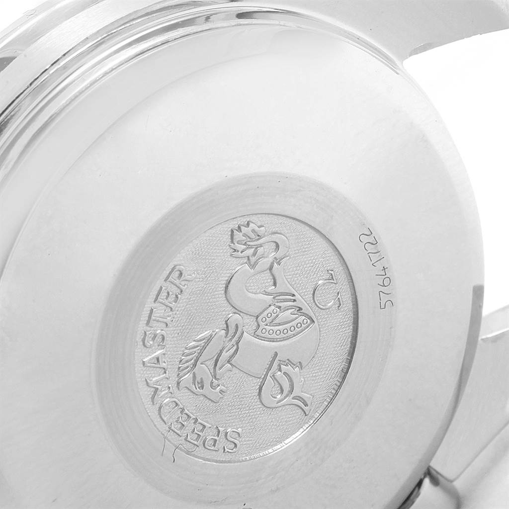 The image shows the engraved caseback of an Omega Speedmaster 3513.50.00 Men
s Stainless Steel Black Dial 3513.50.00 Men
s Stainless Steel Black Dial watch from a slightly angled, macro perspective.