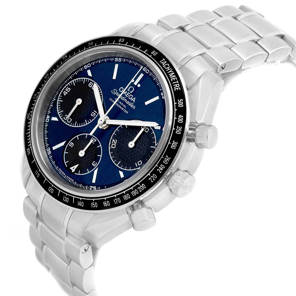 The Omega Speedmaster 326.30.40.50.03.001 Men
s Stainless Steel Blue Dial 326.30.40.50.03.001 Men
s Stainless Steel Blue Dial watch is shown at a three-quarter angle, highlighting its tachymeter bezel, blue dial, subdials, and stainless steel bracelet.