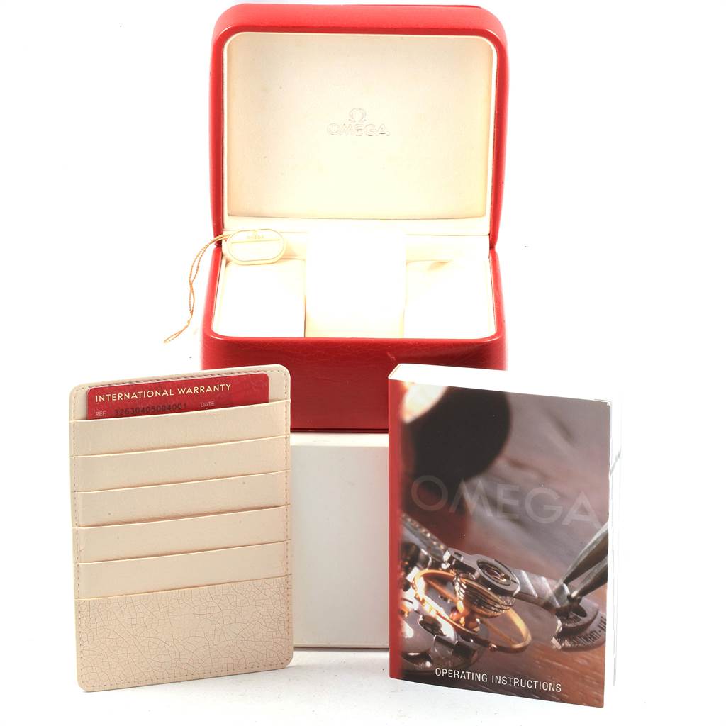 This image shows the packaging, international warranty card, and operating instructions for an Omega Speedmaster 326.30.40.50.04.001 Men
s Stainless Steel White Dial 326.30.40.50.04.001 Men
s Stainless Steel White Dial watch.
