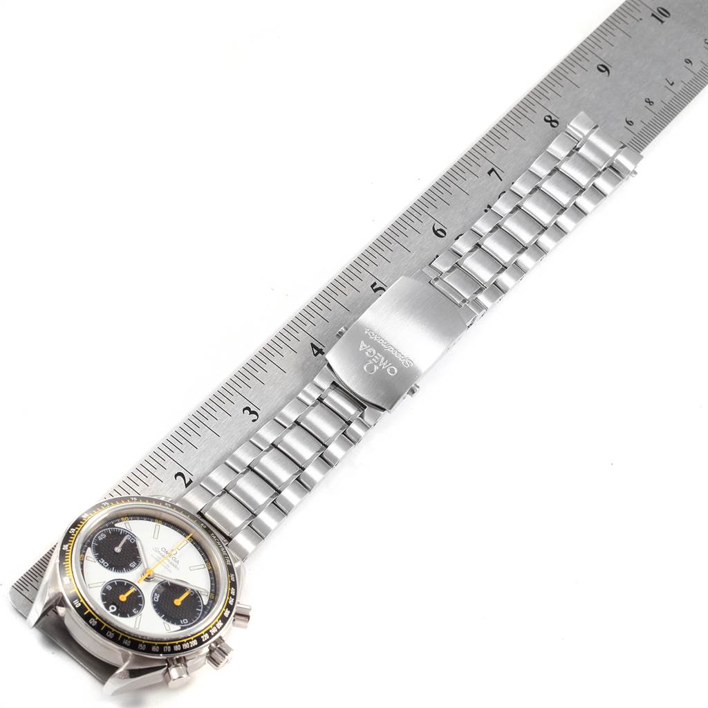 The image shows an Omega Speedmaster 326.30.40.50.04.001 Men
s Stainless Steel White Dial 326.30.40.50.04.001 Men
s Stainless Steel White Dial watch laid flat with a metal bracelet against a ruler for measurement.