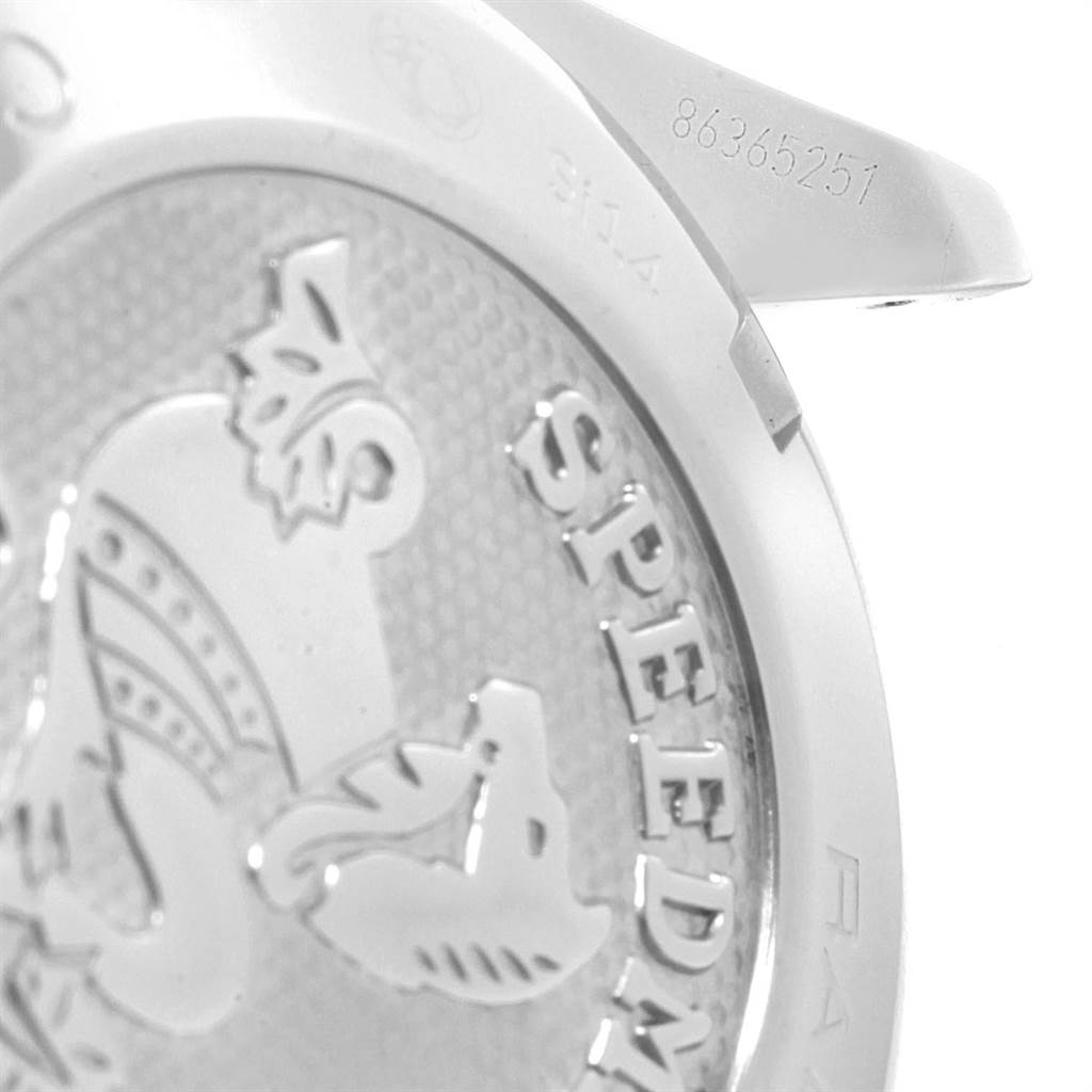 The image shows a close-up of the case back of an Omega Speedmaster 326.30.40.50.04.001 Men
s Stainless Steel White Dial 326.30.40.50.04.001 Men
s Stainless Steel White Dial watch, including its engraved logo and part of the serial number.