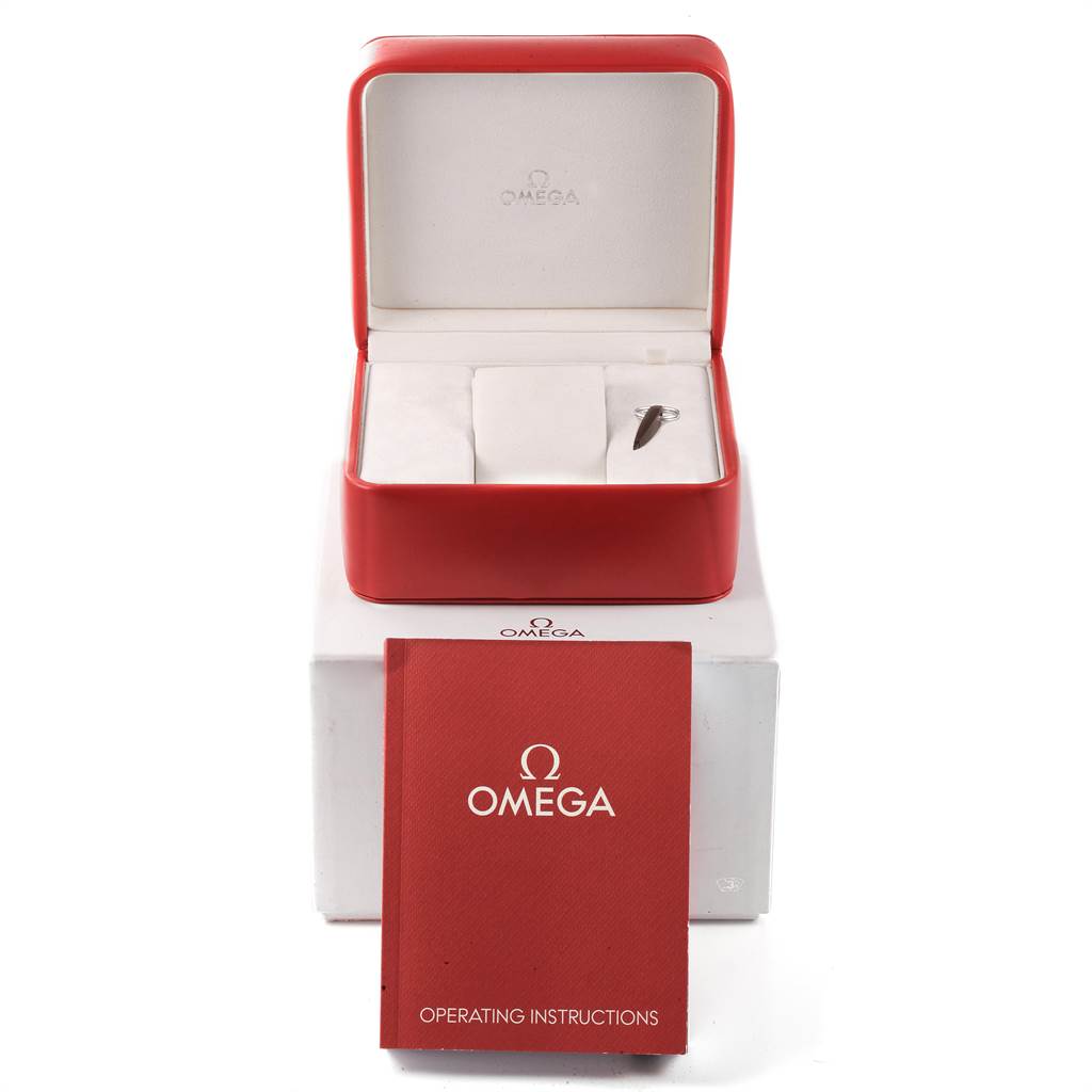 The image shows the packaging and instruction manual for an Omega Speedmaster 327.10.43.50.01.001 Men
s Stainless Steel Black Dial 327.10.43.50.01.001 Men
s Stainless Steel Black Dial watch, without the watch inside.