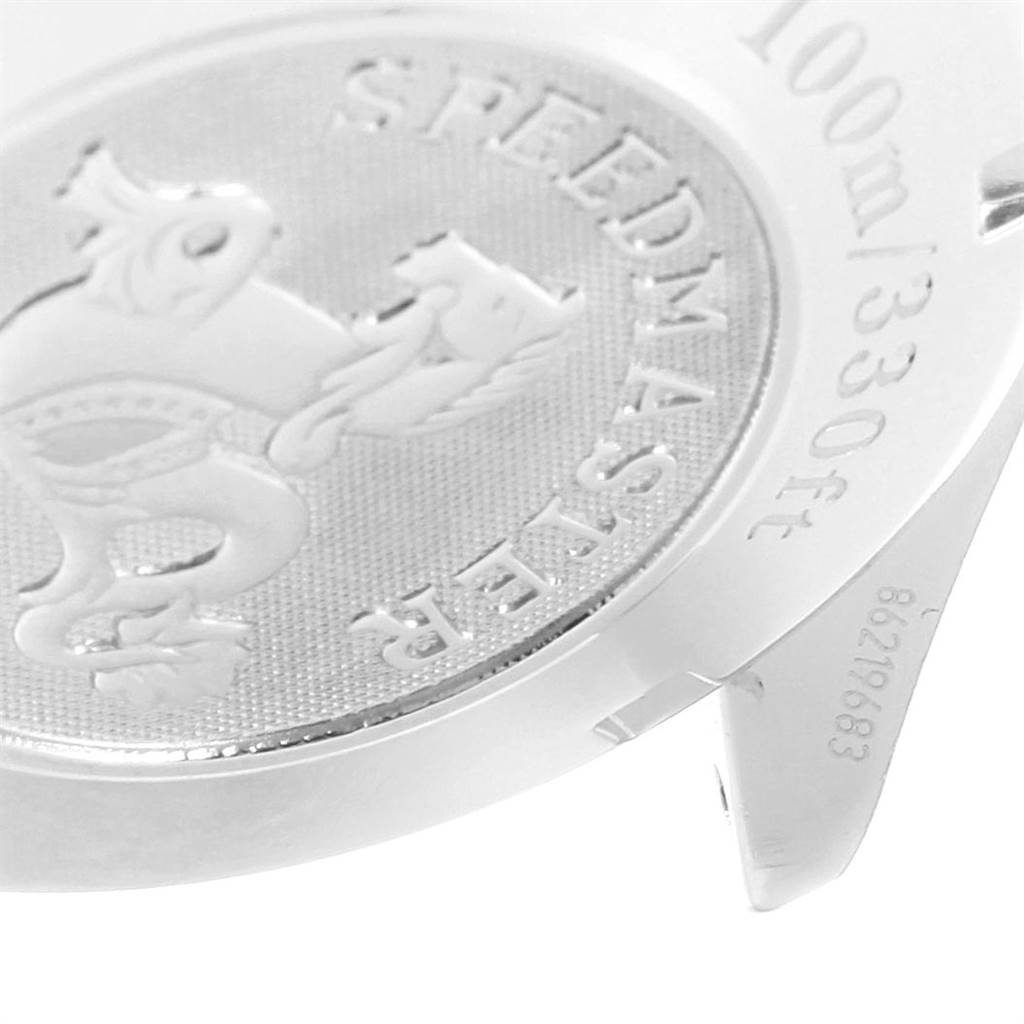 This image shows a close-up of the case back and part of the lug of an Omega Speedmaster 3212.80.00 Men
s Stainless Steel Blue Dial 3212.80.00 Men
s Stainless Steel Blue Dial watch.