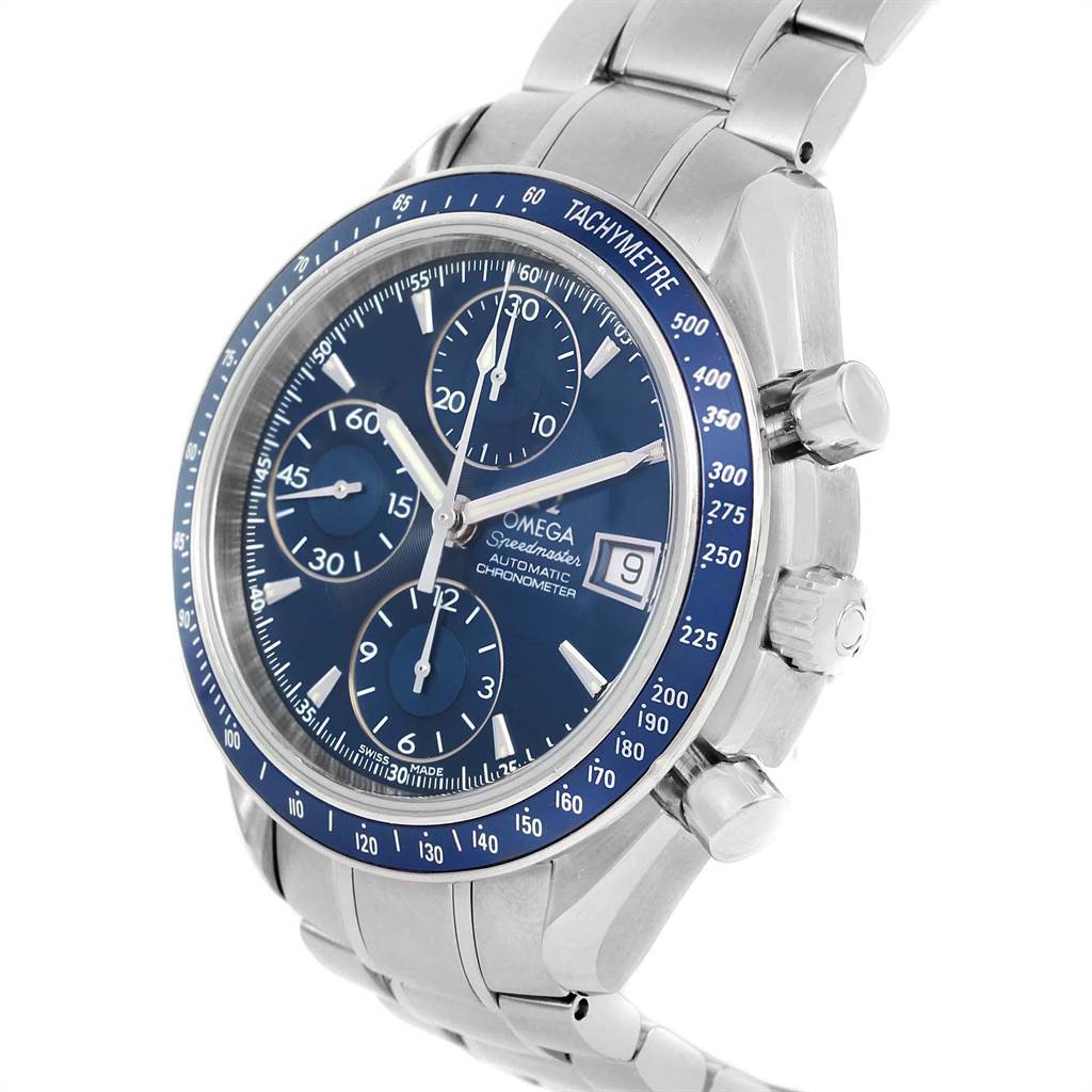 The image shows a close-up side angle of an Omega Speedmaster 3212.80.00 Men
s Stainless Steel Blue Dial 3212.80.00 Men
s Stainless Steel Blue Dial watch, displaying the tachymeter bezel, chronograph dials, and stainless steel bracelet.