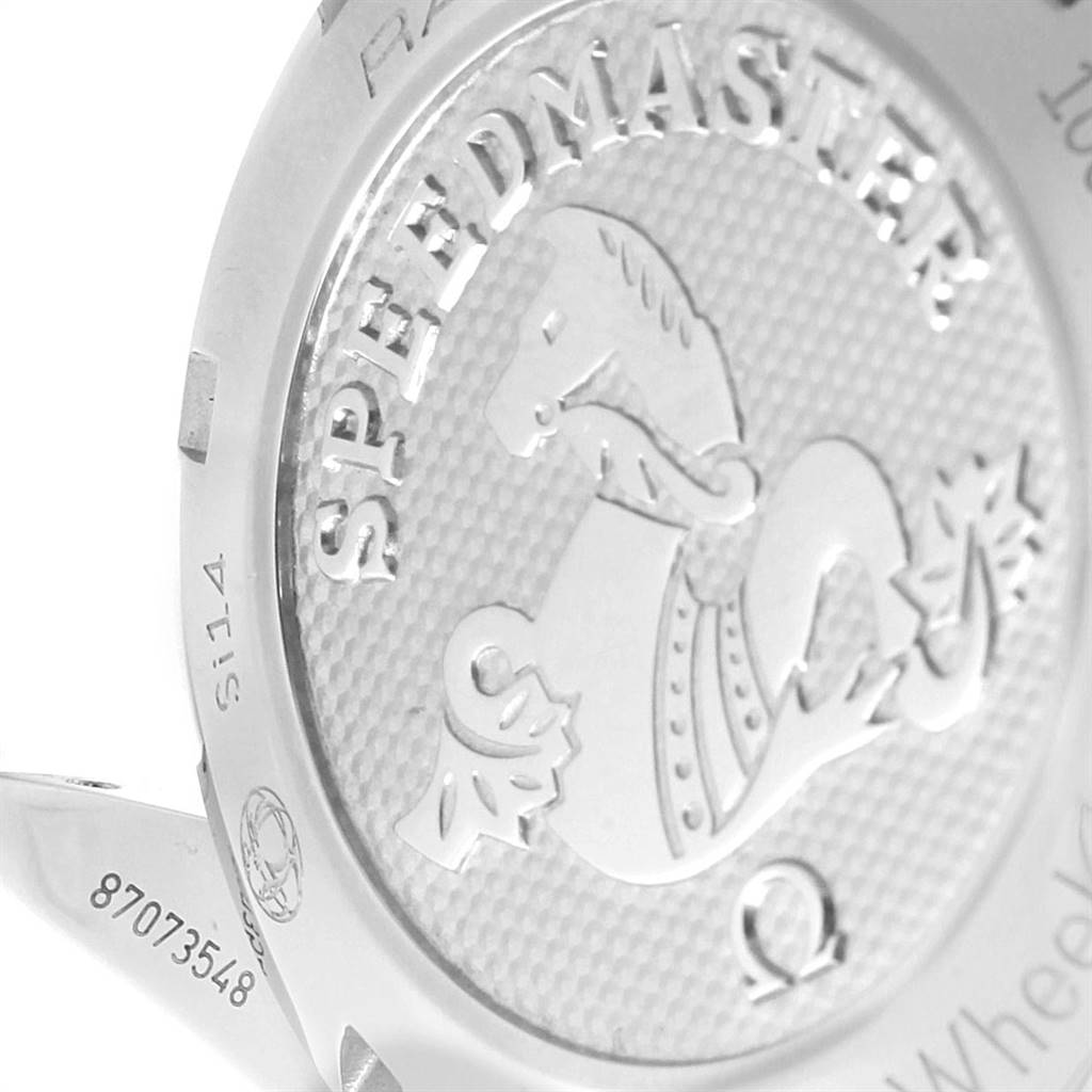 This image shows the back case of the Omega Speedmaster 326.30.40.50.06.001 Men
s Stainless Steel Grey Dial 326.30.40.50.06.001 Men
s Stainless Steel Grey Dial watch at an angle that highlights the embossed branding and logo.