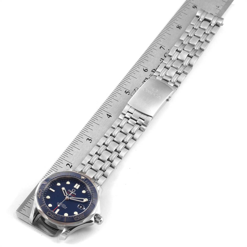 The image shows an Omega Speedmaster 212.30.41.20.03.001 Men
s Stainless Steel Blue Dial 212.30.41.20.03.001 Men
s Stainless Steel Blue Dial watch laid flat with a stainless steel bracelet and a ruler beside it for scale.