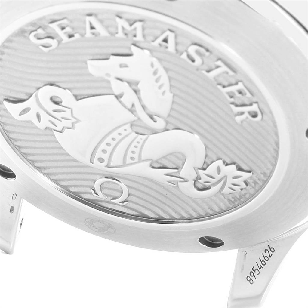 The image shows the Omega Speedmaster 212.30.41.20.03.001 Men
s Stainless Steel Blue Dial 212.30.41.20.03.001 Men
s Stainless Steel Blue Dial
s case back with an engraved design and serial number.