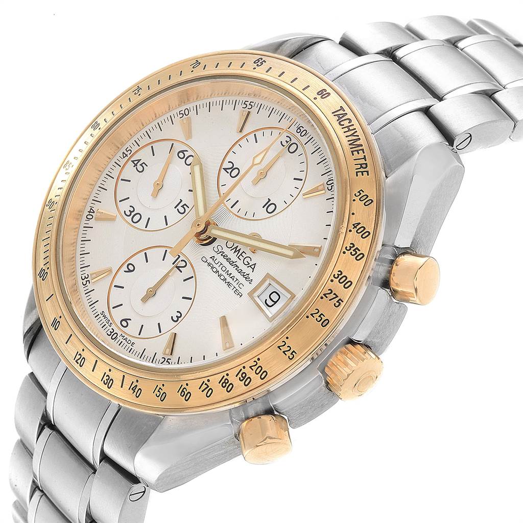The Omega Speedmaster 323.21.40.40.02.001 Men
s Steel and Gold (two tone) Silver Dial 323.21.40.40.02.001 Men
s Steel and Gold (two tone) Silver Dial watch is shown at an angle, highlighting its gold bezel, chronograph dials, and metal bracelet.