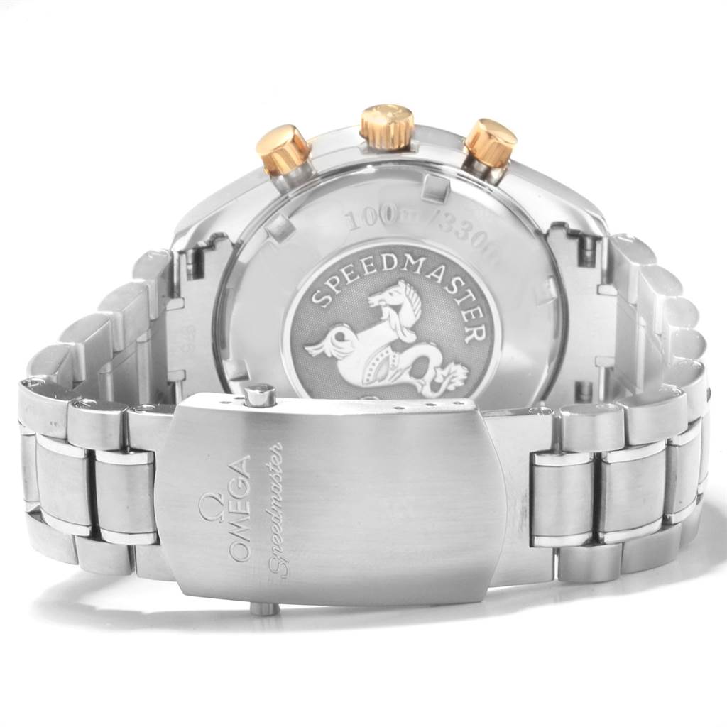 The image shows the back case and bracelet of the Omega Speedmaster 323.21.40.40.02.001 Men
s Steel and Gold (two tone) Silver Dial 323.21.40.40.02.001 Men
s Steel and Gold (two tone) Silver Dial watch, highlighting the clasp and screw-down crown.