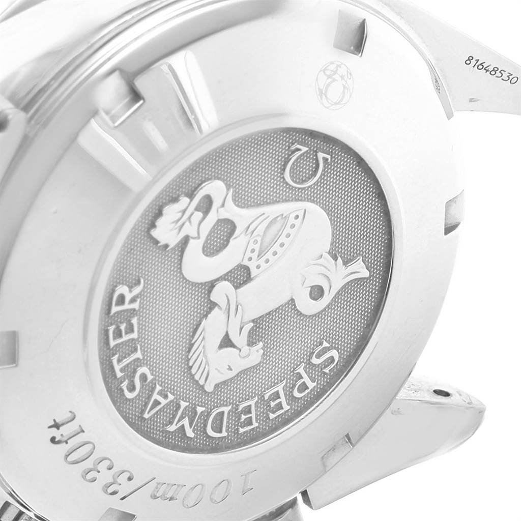 This image shows the case back of the Omega Speedmaster 323.21.40.40.02.001 Men
s Steel and Gold (two tone) Silver Dial 323.21.40.40.02.001 Men
s Steel and Gold (two tone) Silver Dial watch at an angled close-up view.