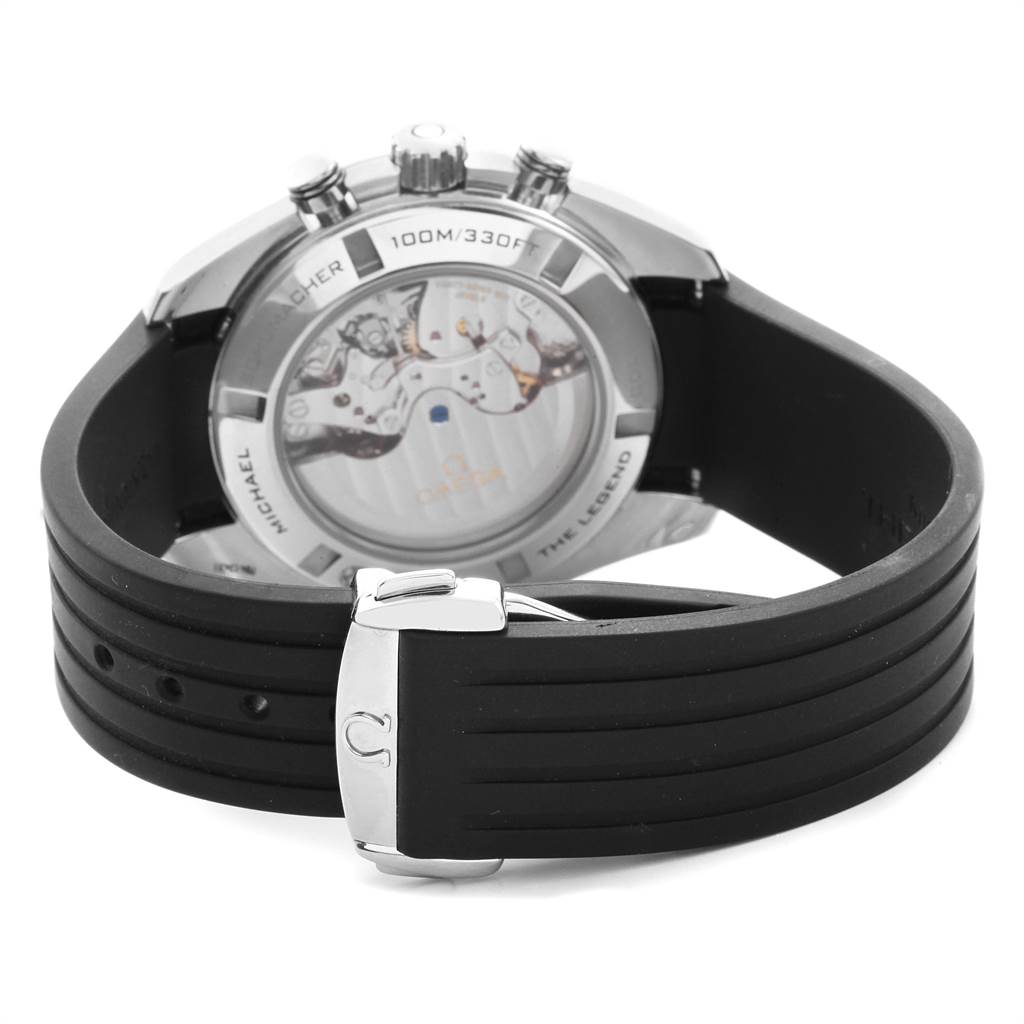 The image shows the back view of an Omega Speedmaster 321.32.44.50.01.001 Men's Stainless Steel Black Dial 321.32.44.50.01.001 Men's Stainless Steel Black Dial watch, highlighting its transparent case back and black rubber strap.