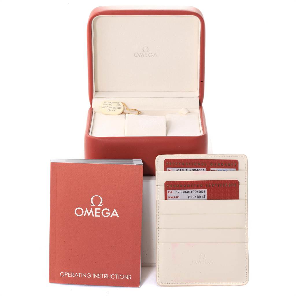 This image shows the packaging, operating instructions, and warranty cards for an Omega Speedmaster 323.30.40.40.04.001 Men
s Stainless Steel White Dial 323.30.40.40.04.001 Men
s Stainless Steel White Dial watch.