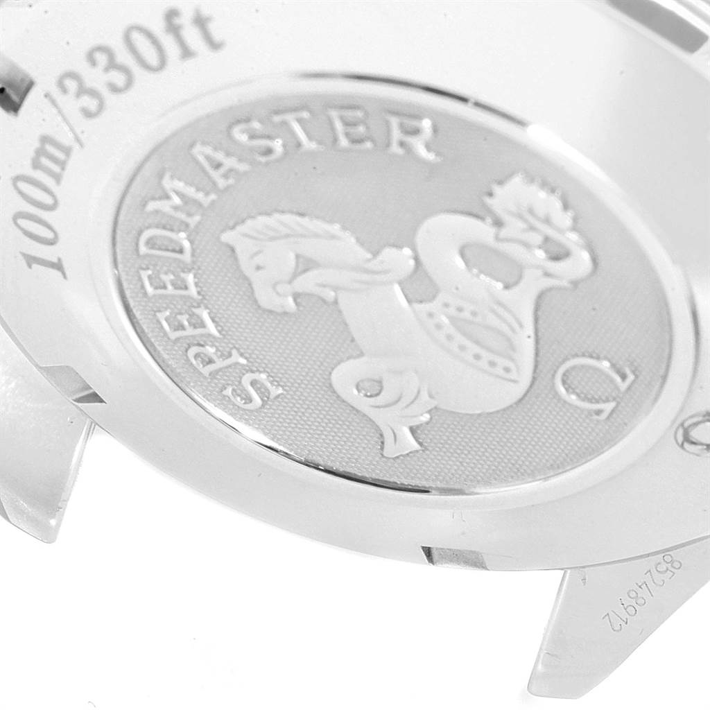 The image shows a close-up of the case back of an Omega Speedmaster 323.30.40.40.04.001 Men
s Stainless Steel White Dial 323.30.40.40.04.001 Men
s Stainless Steel White Dial watch, highlighting the engraved details and water resistance.