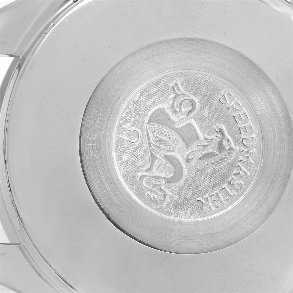 The image shows the back case of an Omega Speedmaster 3511.50.00 Men
s Stainless Steel Black Dial 3511.50.00 Men
s Stainless Steel Black Dial watch, highlighting the engraved emblem and model name.