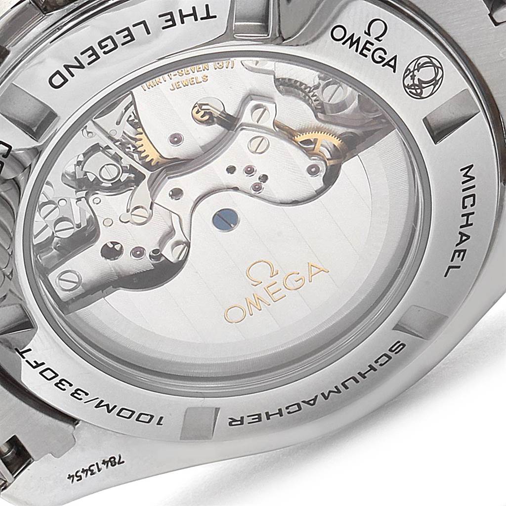 The image shows the back view of an Omega Speedmaster 321.32.44.50.01.001 Men
s Stainless Steel Black Dial 321.32.44.50.01.001 Men
s Stainless Steel Black Dial watch, highlighting the intricate mechanism and branding.