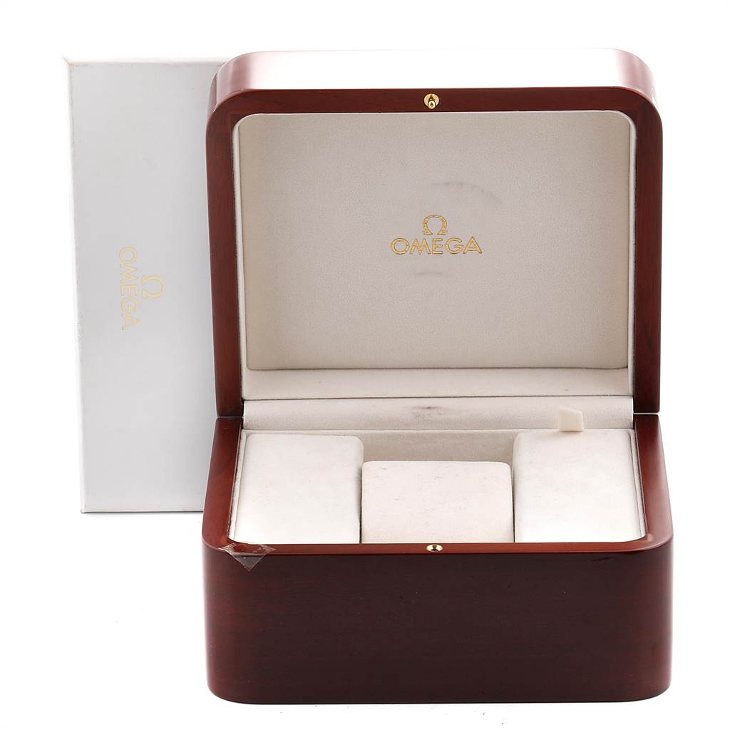 The image shows a wooden Omega Speedmaster 331.20.42.51.01.002 Men's Steel and Gold (two tone) Black Dial 331.20.42.51.01.002 Men's Steel and Gold (two tone) Black Dial watch box with an open lid and padded compartments inside.