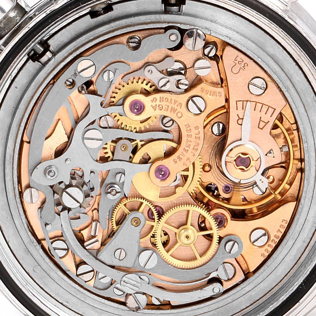 This is an up-close view of the movement inside an Omega Speedmaster 105.012 Men's Stainless Steel Black Dial 105.012 Men's Stainless Steel Black Dial watch, showcasing gears and mechanical components.