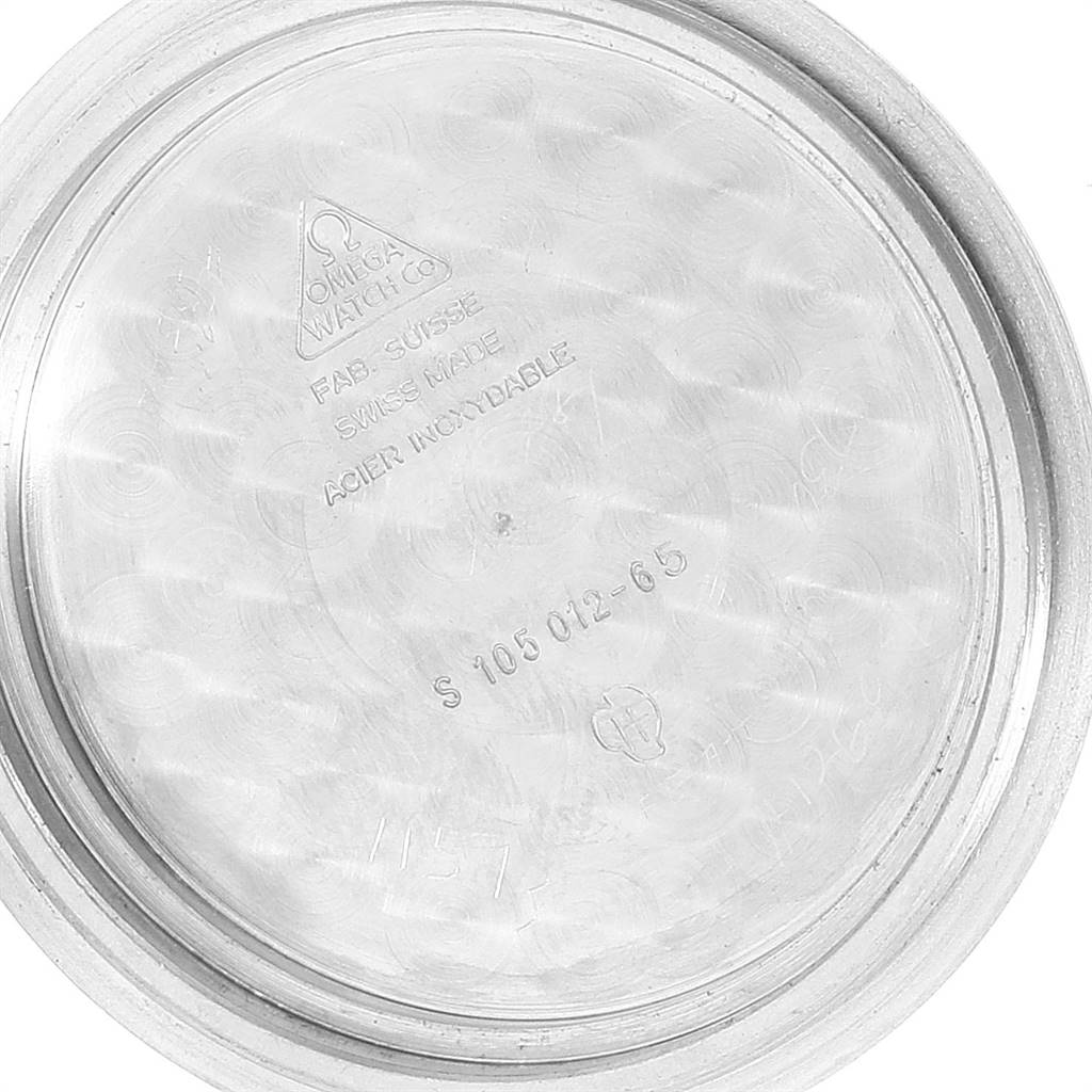 This image shows the case back interior of an Omega Speedmaster 105.012 Men's Stainless Steel Black Dial 105.012 Men's Stainless Steel Black Dial watch, featuring the brand and model details.