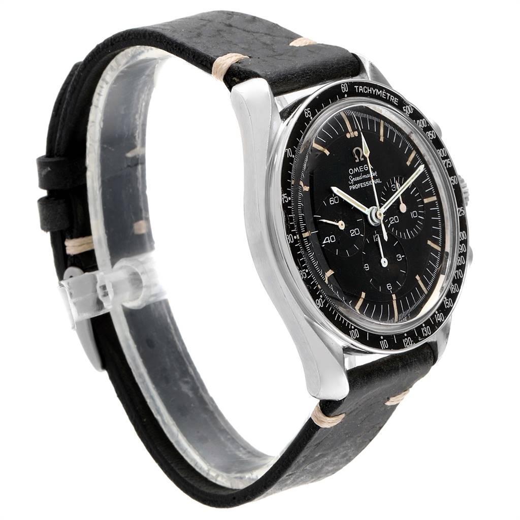 This image shows a side and partial front view of an Omega Speedmaster 105.012 Men's Stainless Steel Black Dial 105.012 Men's Stainless Steel Black Dial watch, displaying the black dial, bezel, and leather strap.