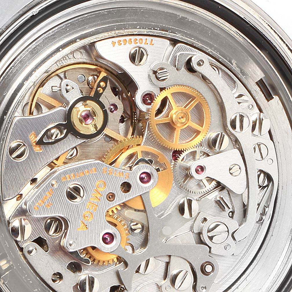 This image shows a close-up view of the intricate internal mechanism of an Omega Speedmaster 3570.50.00 Men
s Stainless Steel Black Dial 3570.50.00 Men
s Stainless Steel Black Dial watch.