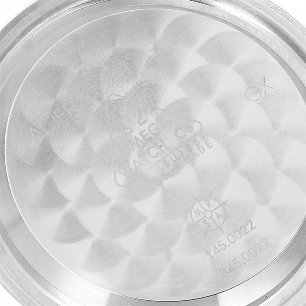 The image shows the inner case back of an Omega Speedmaster 3570.50.00 Men
s Stainless Steel Black Dial 3570.50.00 Men
s Stainless Steel Black Dial watch, displaying the model number and other engravings.