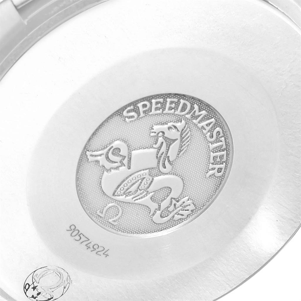 The image shows the inner case back of an Omega Speedmaster 3539.50.00 Men
s Stainless Steel Black Dial 3539.50.00 Men
s Stainless Steel Black Dial watch, featuring its logo and some engraving.