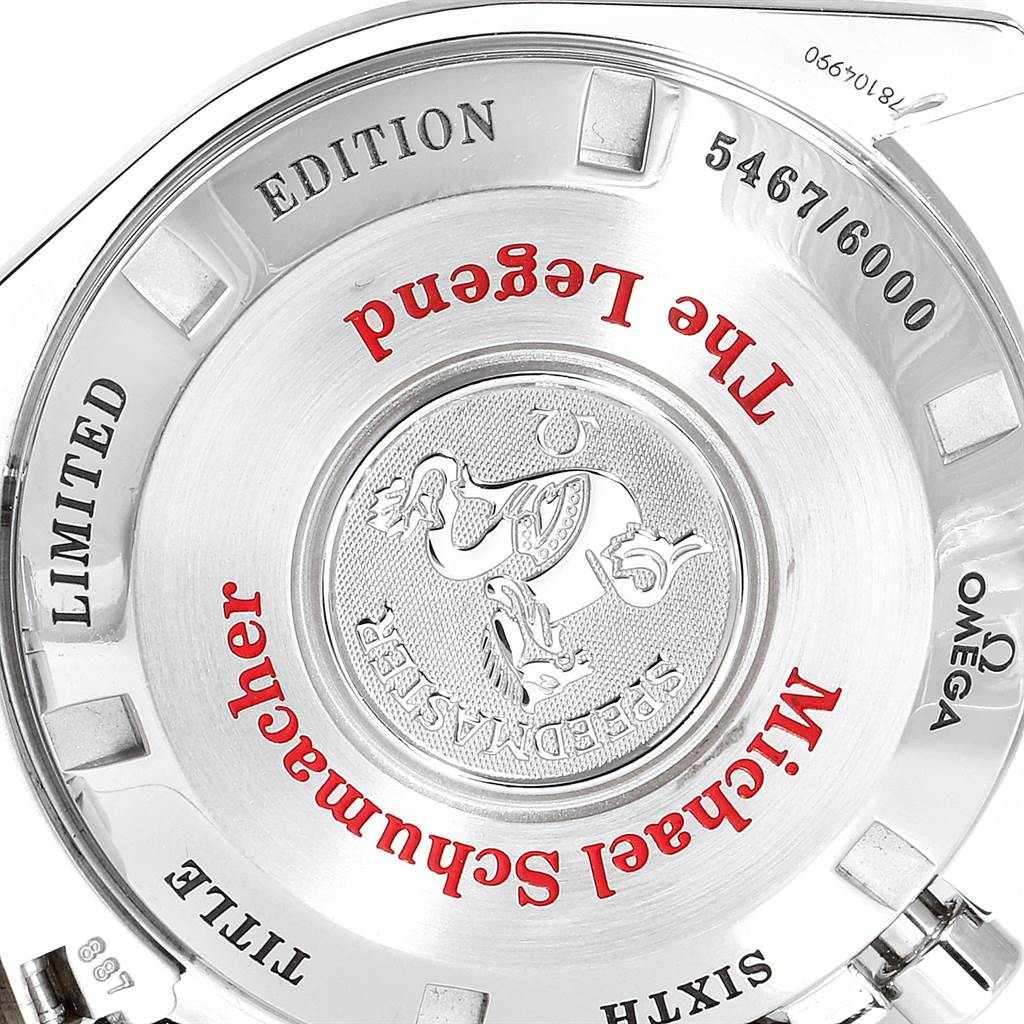 This image shows the back case of an Omega Speedmaster 3559.32.00 Men's Stainless Steel Silver Dial 3559.32.00 Men's Stainless Steel Silver Dial, featuring "Michael Schumacher The Legend" limited edition inscription.