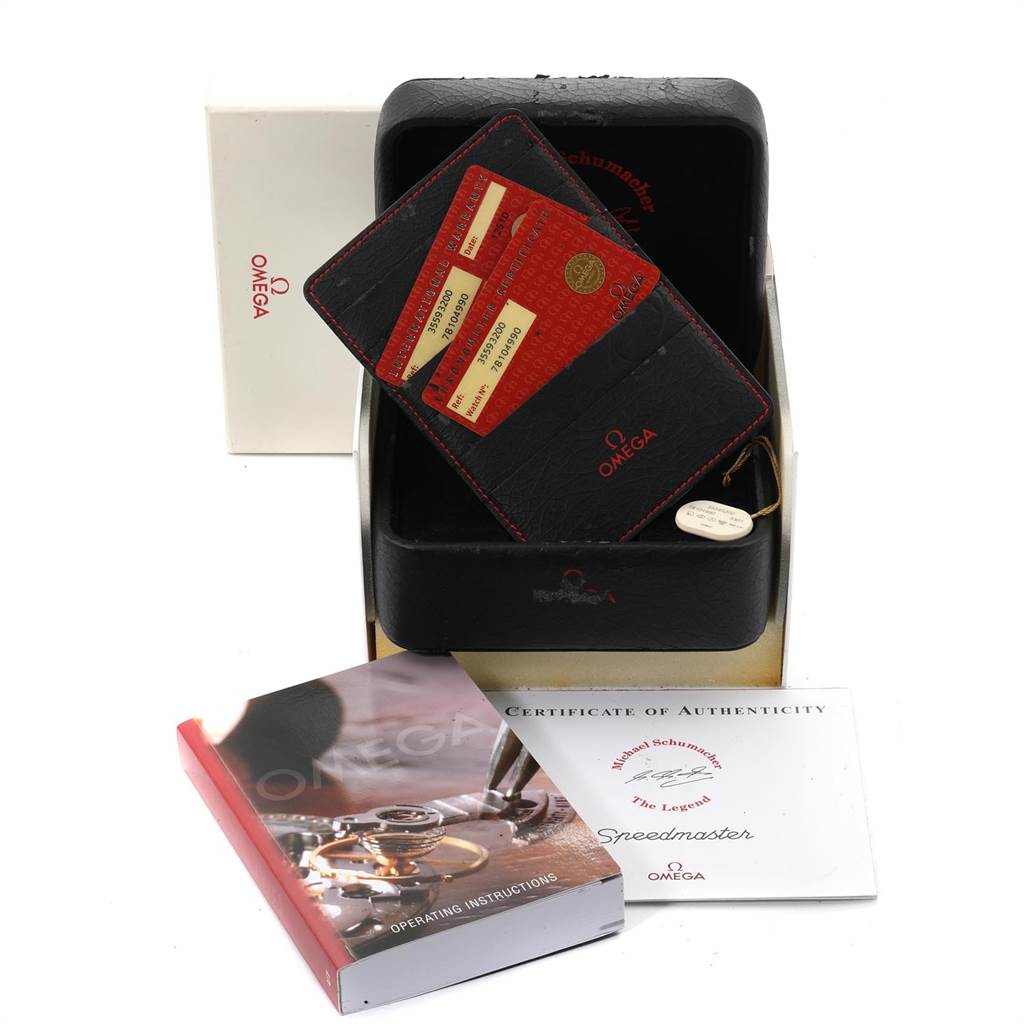 The image shows the box, instruction booklet, certificate of authenticity, and cardholder for the Omega Speedmaster 3559.32.00 Men's Stainless Steel Silver Dial 3559.32.00 Men's Stainless Steel Silver Dial model.