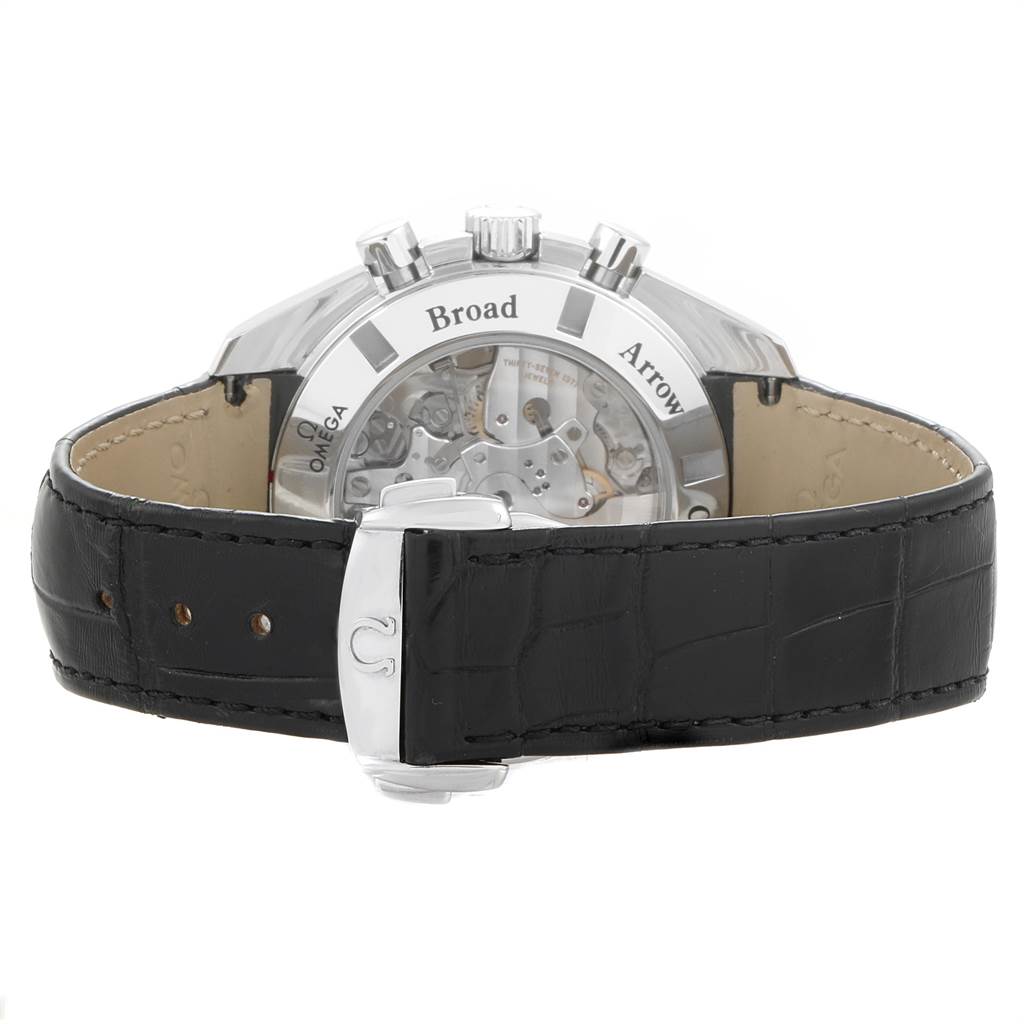 The image shows the back and movement of the Omega Speedmaster 321.13.44.50.02.001 Men
s Stainless Steel Silver Dial 321.13.44.50.02.001 Men
s Stainless Steel Silver Dial Broad Arrow watch with a black leather strap and buckle.