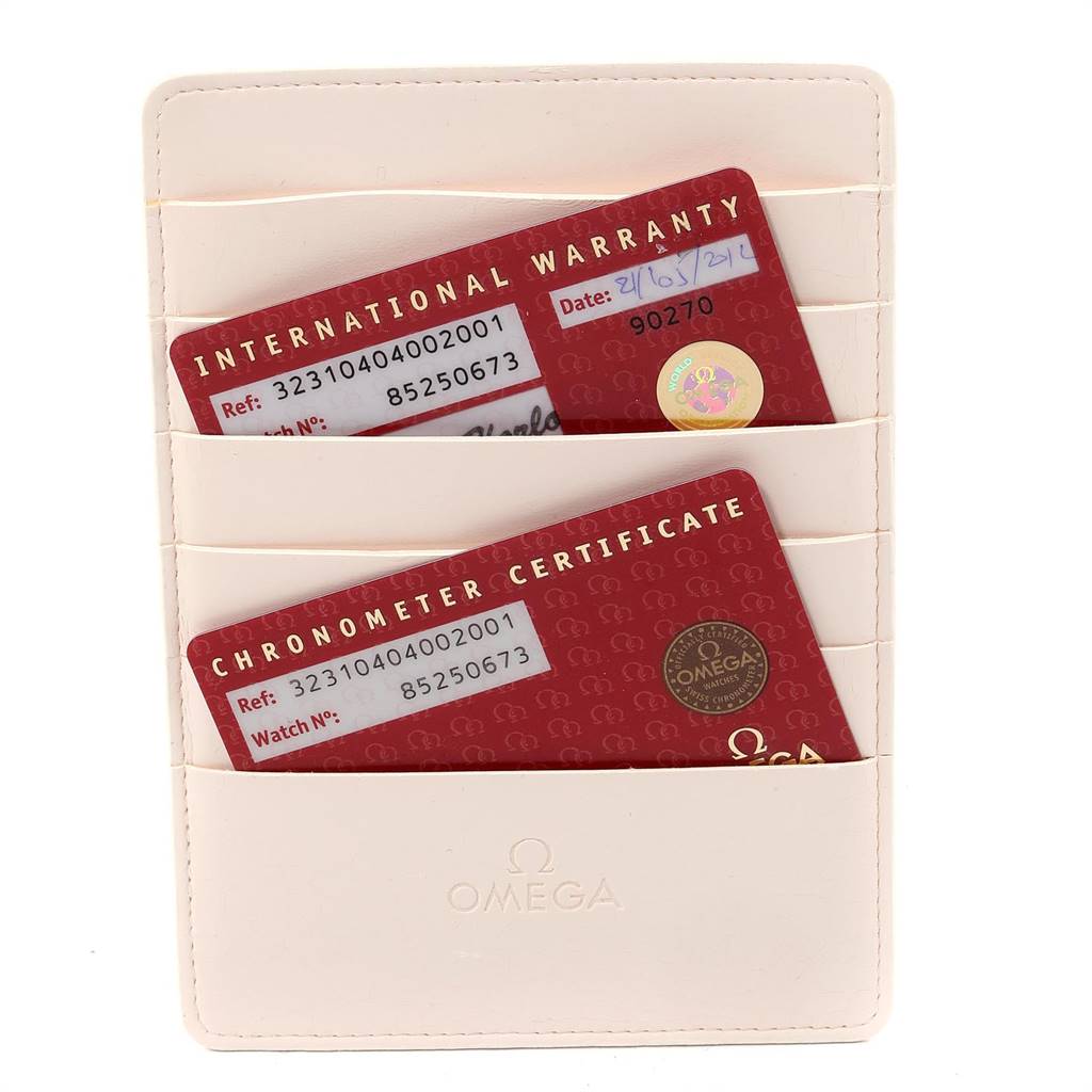 The image shows international warranty and chronometer certificate cards for an Omega Speedmaster 323.10.40.40.02.001 Men
s Stainless Steel Silver Dial 323.10.40.40.02.001 Men
s Stainless Steel Silver Dial, in a cardholder.