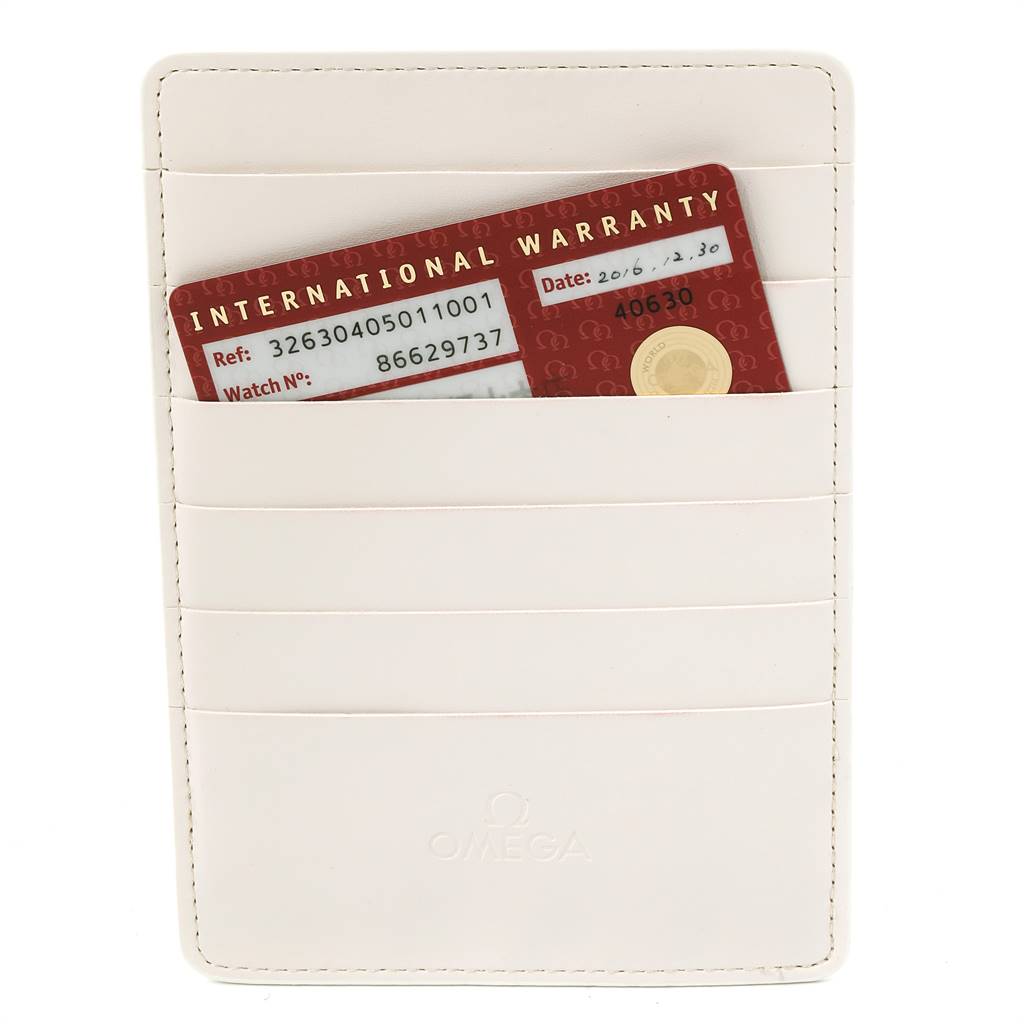 The image shows an Omega Speedmaster 326.30.40.50.11.001 Men's Stainless Steel Red Dial 326.30.40.50.11.001 Men's Stainless Steel Red Dial international warranty card in a white Omega cardholder, viewed from the front.