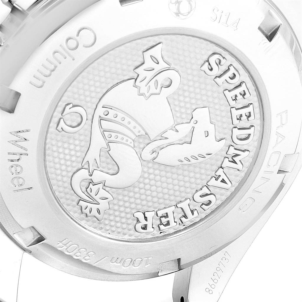 The image shows the back case of the Omega Speedmaster 326.30.40.50.11.001 Men's Stainless Steel Red Dial 326.30.40.50.11.001 Men's Stainless Steel Red Dial watch, featuring engraved text and logos.