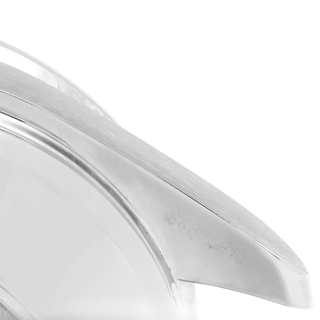 This image shows a close-up of a lug on an Omega Speedmaster 323.30.40.40.04.001 Men
s Stainless Steel White Dial 323.30.40.40.04.001 Men
s Stainless Steel White Dial watch case.