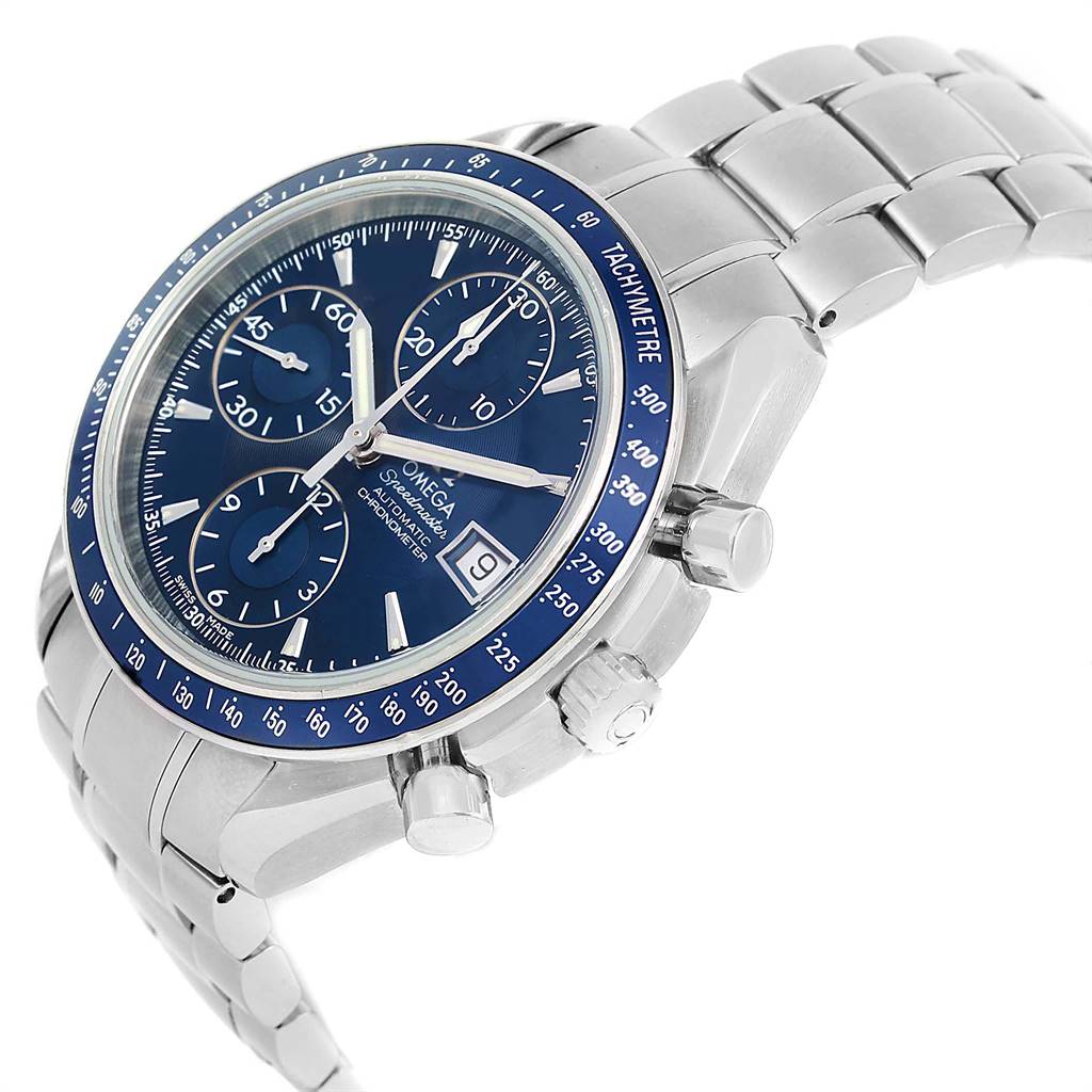 This side-angle view of an Omega Speedmaster 3212.80.00 Men's Stainless Steel Blue Dial 3212.80.00 Men's Stainless Steel Blue Dial watch shows the face, chronograph dials, tachymetric scale, pushers, and part of the bracelet.