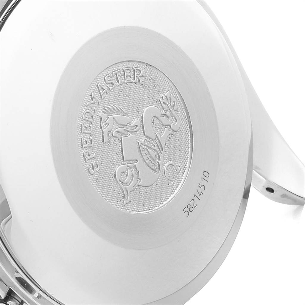 The image shows the case back of an Omega Speedmaster 3513.82.00 Men
s Stainless Steel Blue Dial 3513.82.00 Men
s Stainless Steel Blue Dial watch at a slight angle, highlighting its engraving and serial number.