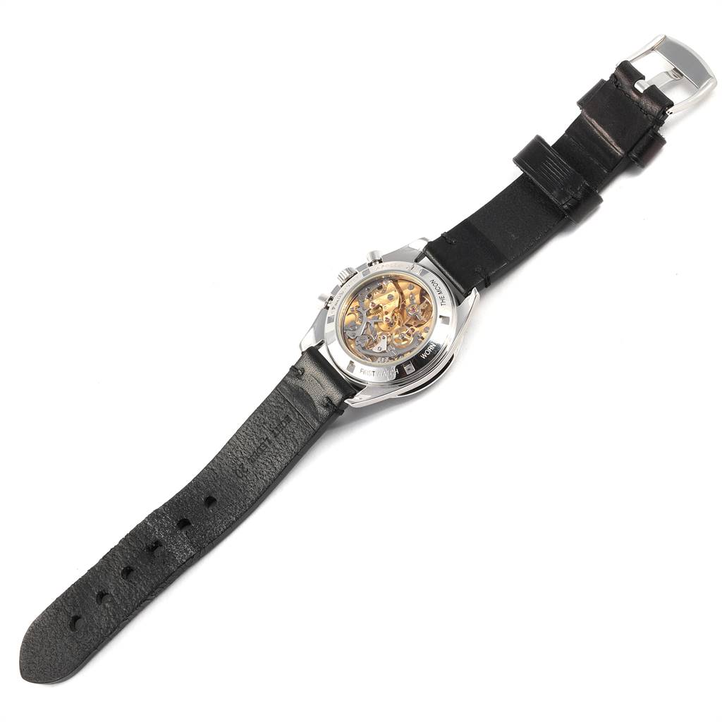 This image shows the back view of an Omega Speedmaster 3570.50.00 Men
s Stainless Steel Black Dial 3570.50.00 Men
s Stainless Steel Black Dial watch, highlighting its transparent case back and black leather strap.