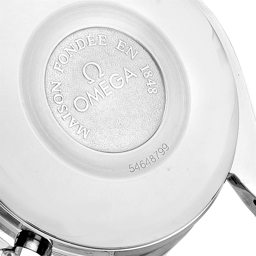 The image shows the back case of an Omega Speedmaster 3521.80.00 Men
s Stainless Steel Blue Dial 3521.80.00 Men
s Stainless Steel Blue Dial watch, highlighting the engravings on its back.