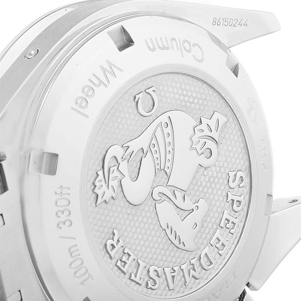 The image shows the case back of the Omega Speedmaster 326.30.40.50.02.001 Men
s Stainless Steel Silver Dial 326.30.40.50.02.001 Men
s Stainless Steel Silver Dial watch, highlighting the engraving and surrounding text.