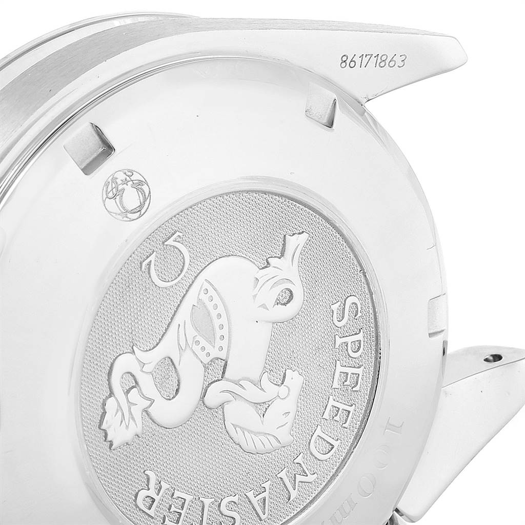 This image shows the case back of the Omega Speedmaster 3211.30.00 Men
s Stainless Steel Silver Dial 3211.30.00 Men
s Stainless Steel Silver Dial watch at an angle, featuring the engraved logo and serial number.