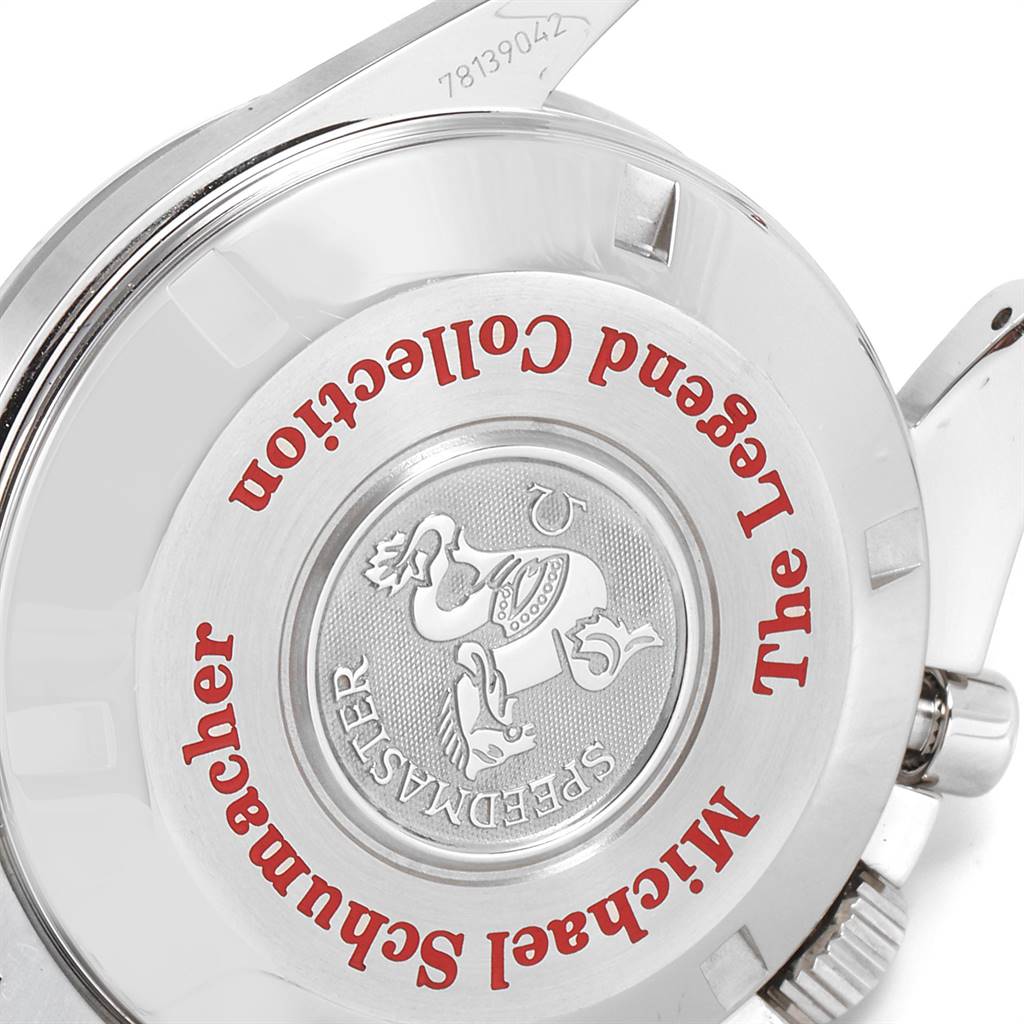 The image shows the back of an Omega Speedmaster 3506.31.00 Men
s Stainless Steel Silver Dial 3506.31.00 Men
s Stainless Steel Silver Dial watch, highlighting the engraved emblem and text.