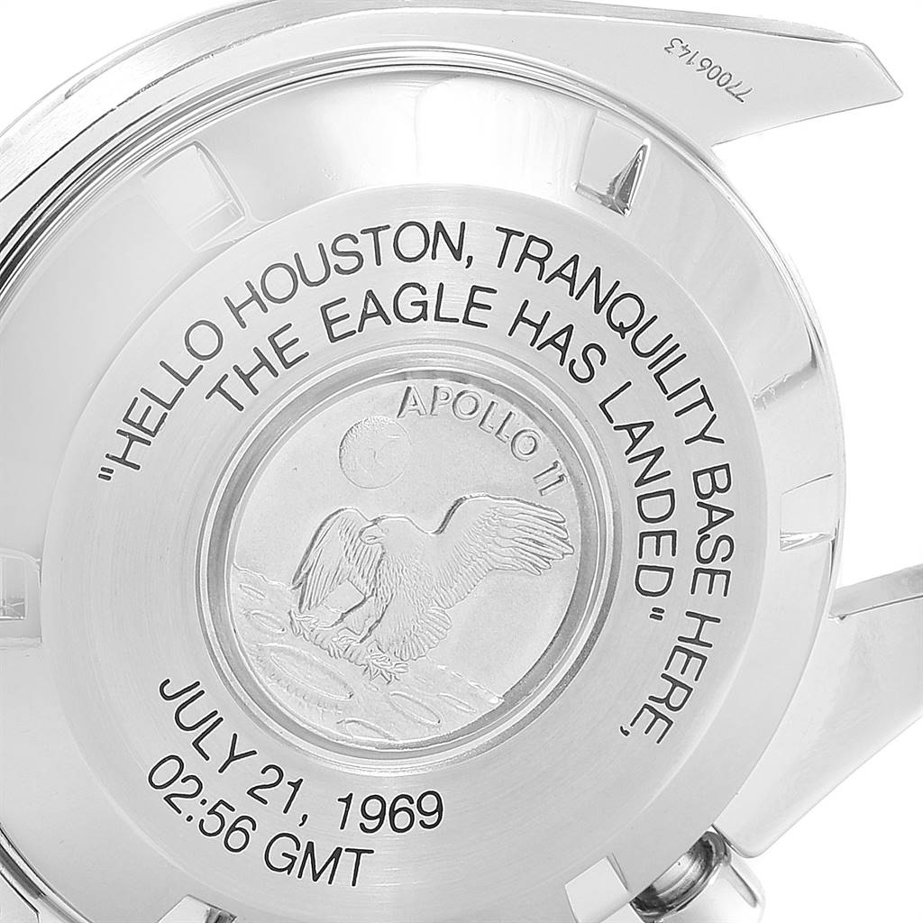The image shows the engraved case back of an Omega Speedmaster 3560.50.00 Men
s Stainless Steel Black Dial 3560.50.00 Men
s Stainless Steel Black Dial watch with Apollo 11 mission details.