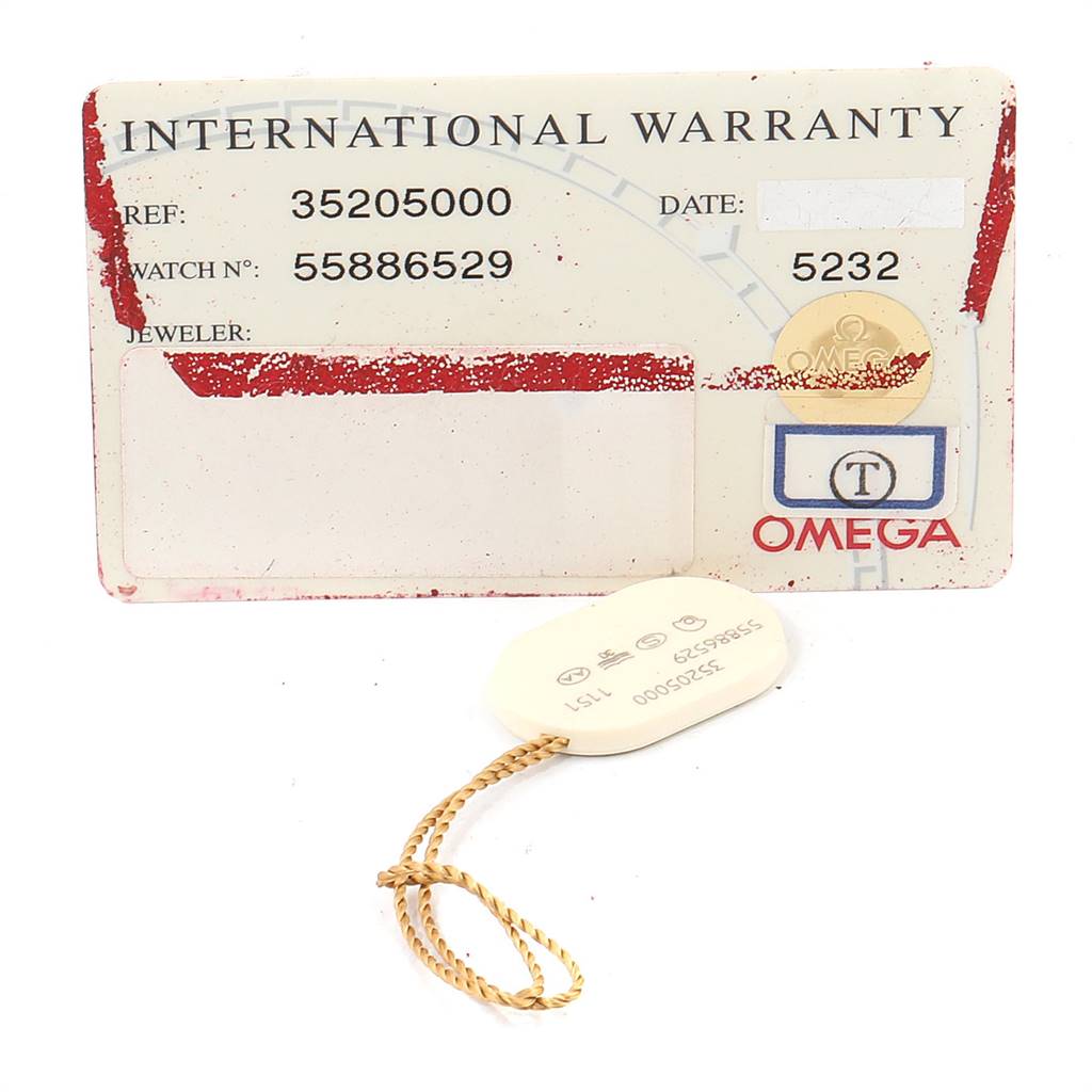The image shows an International Warranty card and a hang tag for the Omega Speedmaster 3520.50.00 Men
s Stainless Steel Black Dial 3520.50.00 Men
s Stainless Steel Black Dial watch model.