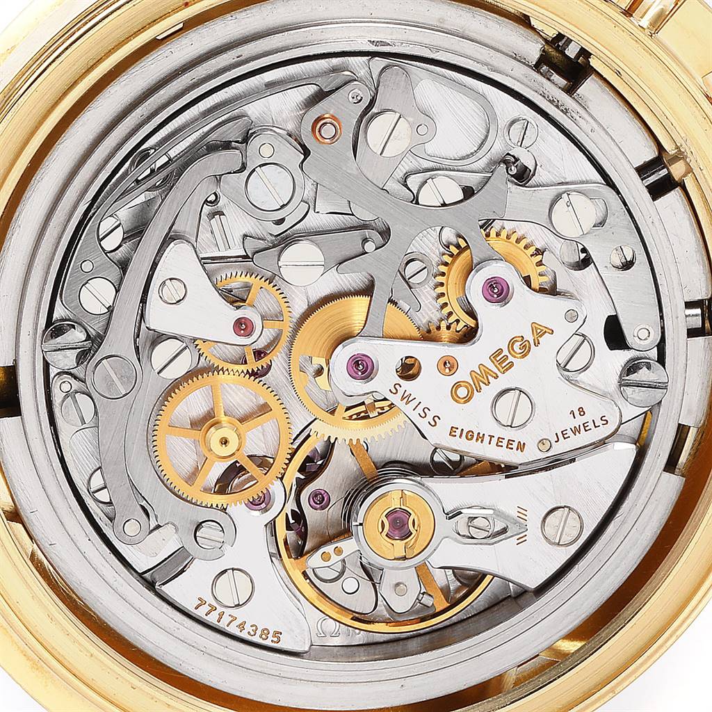 This image shows a close-up of the inner mechanical movement of an Omega Speedmaster 3695.50.31 Men's Yellow Gold Black Dial 3695.50.31 Men's Yellow Gold Black Dial watch.