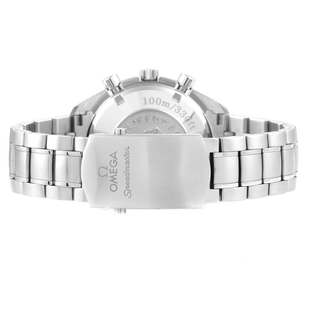 The image shows the back view of a Speedmaster watch by Omega, highlighting the clasp and part of the bracelet.